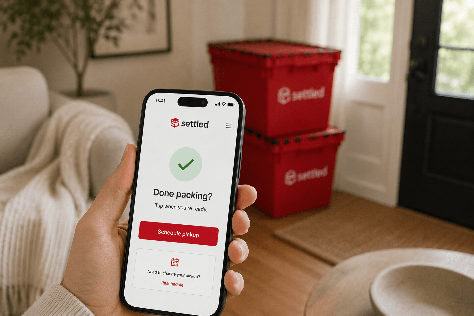 A phone showing the Settled app, with a 'Done packing? Schedule pickup' screen